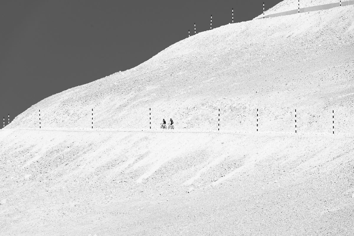 Mont Ventoux - 2 Riders set against the sunlight slopes of Mont Ventoux - b&w - Dark - Cycling photography prints and photos by davidt.