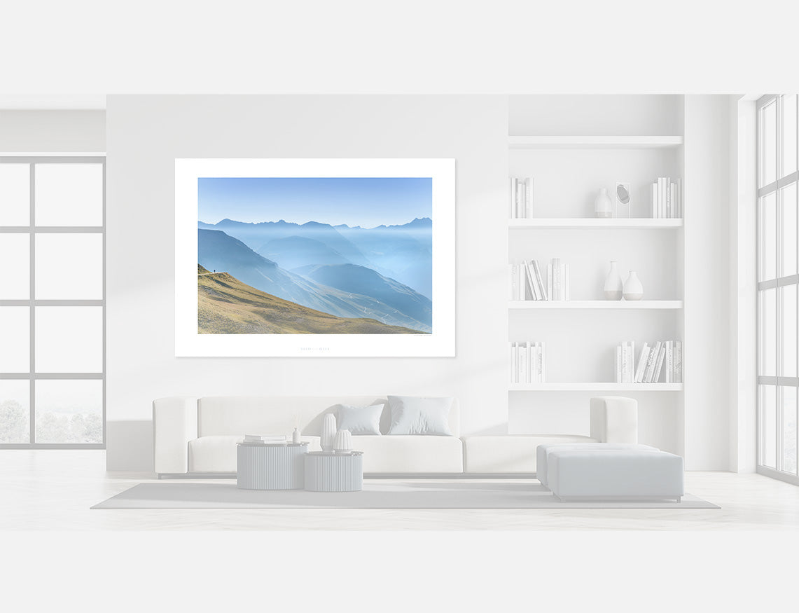 Col de la Bonette - Riders of the High Mountains scenic artwork displayed in modern living room with white decor.