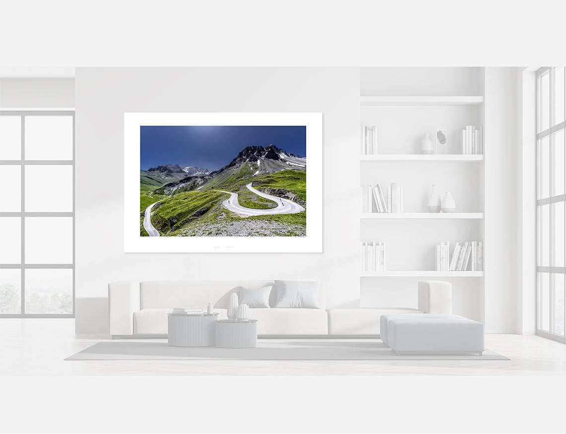 Scenic view of the Col du Galibier The Horseshoe road winding through green mountains.
