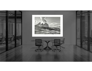 Passo Sella - Black and White duotone art print displayed in a modern office setting with stylish furniture.