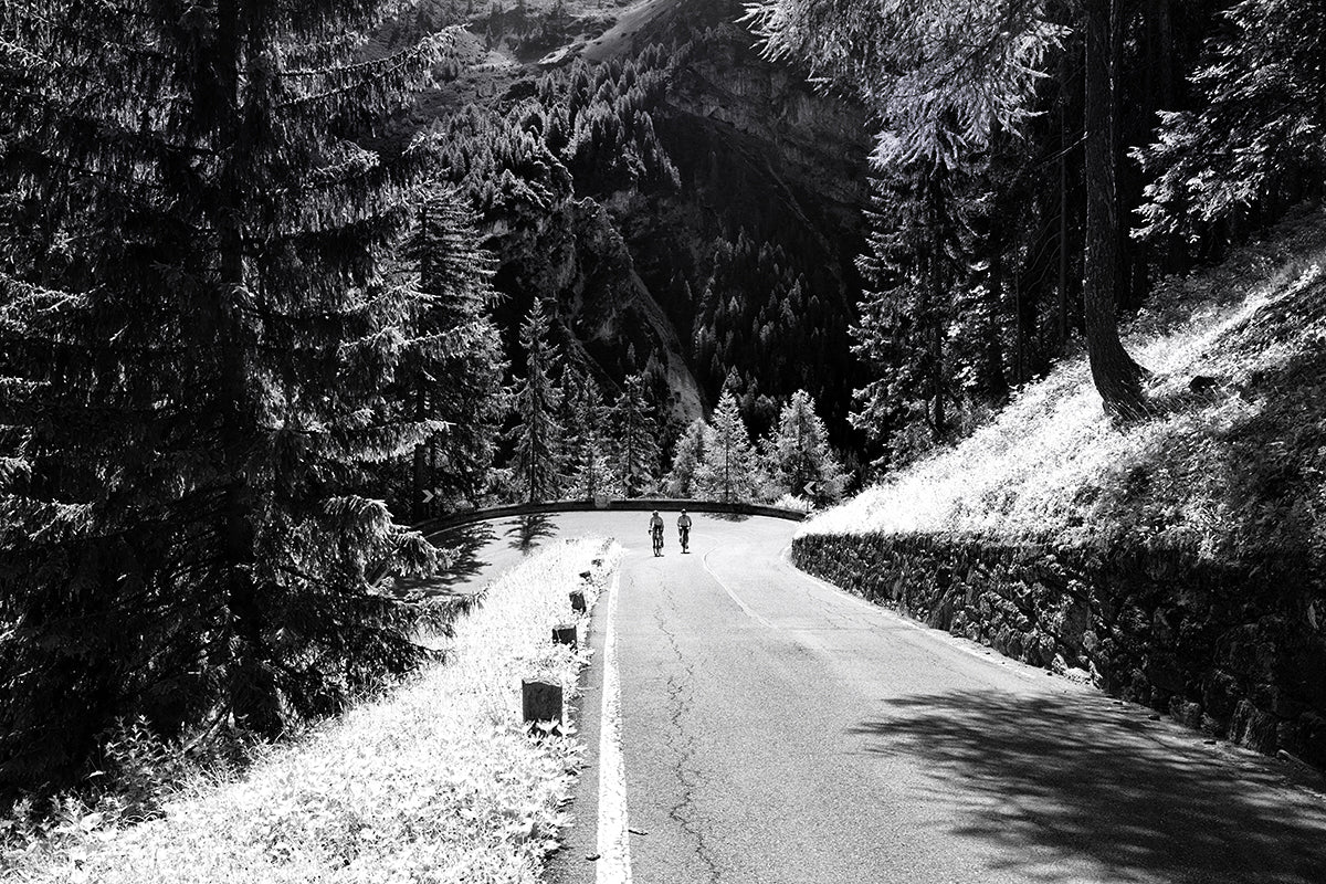 Two riders on the lower slopes of the Passo Stelvio